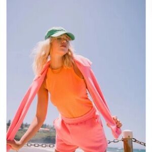 Orange Athletic Tank Top with Sleeveless Design by Araminta James Revolve brand